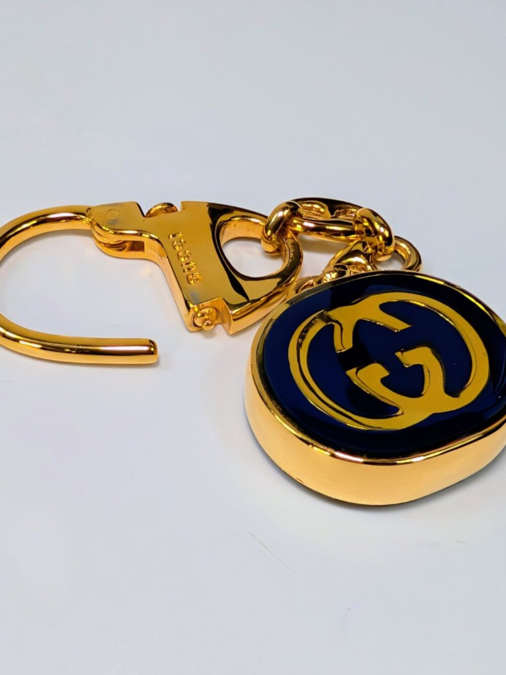Gucci Vintage Gold Tone GG Logo Embossed Circle Bag Charm